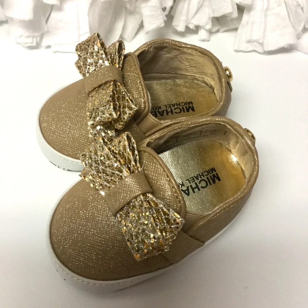 MICHAEL MICHAEL KORS sz 3 Baby Shoes Soft Sole Slip On Metallic Bows Gold NWT